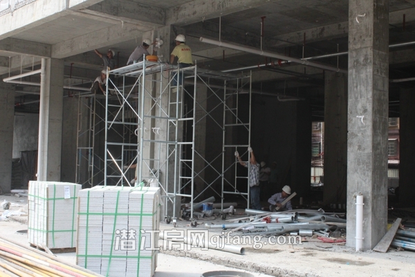 镇声中央公园6月工程进度:外立面正在拆除脚手架