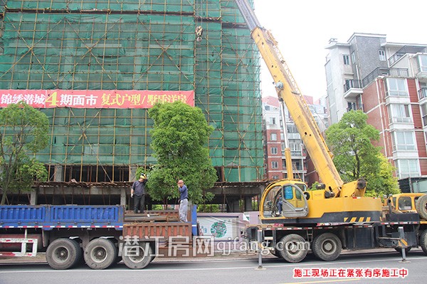 锦绣潜城6月工程进度:锦园一号楼喜封金顶